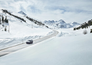 Austria, Tyrol, Sellrain Valley, Kuehtai, Car on mountain road in winter - CVF00318