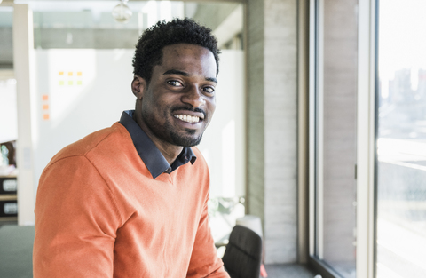 Portrait of smiling casual businessman stock photo