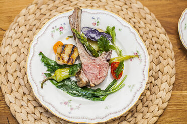 Lamb and vegetables on plate - KVF00128