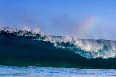 Scenic view of waves against clear blue sky - CAVF28480