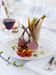Lamb chops and french fries on table - FOLF00334