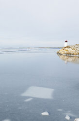 Leuchtturm am zugefrorenen Meer - FOLF00749