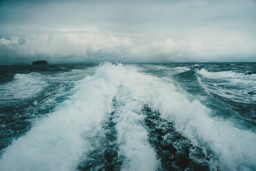 Scenic view of wake in water against sky - CAVF28588