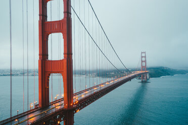 Illuminated Golden Gate Bridge against cloudy sky - CAVF28598