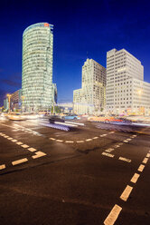 Road intersection and illuminated skyscrapers at night - FOLF00926