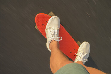 Low-section shot of skater riding red shortboard - FOLF01345