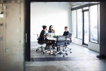 Business people discussing in meeting at creative office - CAVF29444