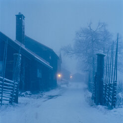 Farm buildings at winter night - FOLF02055