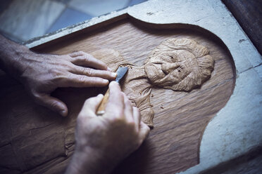 Cropped image of man carving in workshop - CAVF29569
