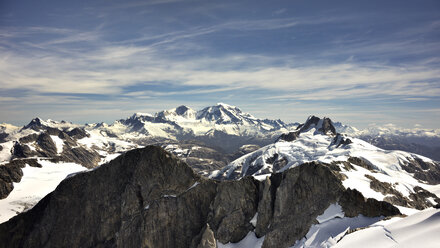 Scenic view of snowcapped mountains against sky - CAVF29744