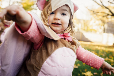 Portrait of cute baby girl wearing bird costume - CAVF29860