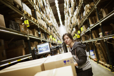 Young woman working in warehouse - FOLF02074