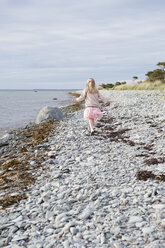 Girl walking by sea - FOLF02180