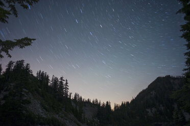 Low angle view of mountain and star trails during sunset - CAVF30092