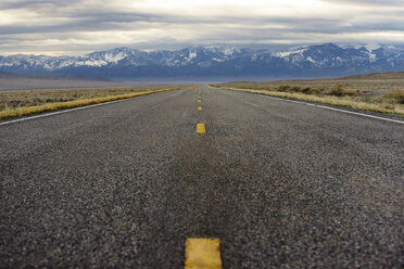 Low angle of Highway leading towards mountain - CAVF30158