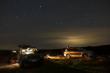 Off-road vehicle and SUV at Gifford Pinchot National Forest during night - CAVF30163