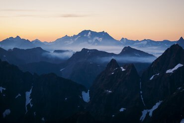 Scenic view of mountains against sky .during sunset - CAVF30306