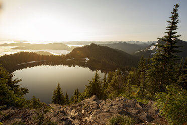 Scenic view of lake by mountains against sky - CAVF30377