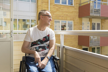 Man on wheelchair on balcony - FOLF02299