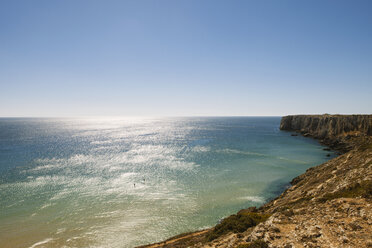 Scenic view of sea by cliff against clear sky - CAVF30659