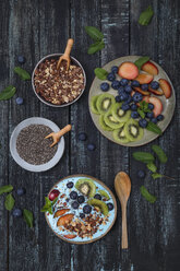 Superfood smoothie bowl with chia seeds, blueberries, nectarine, kiwi and chocolate granola - RTBF01104