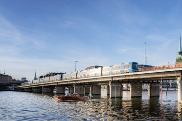 Train on bridge on sunny day - FOLF03740