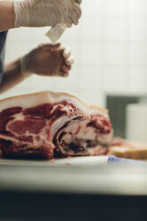Butcher preparing meat - FOLF03813
