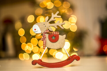 Wooden reindeer figurine, points of light - SARF03629