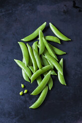 Pea pods on dark metal - CSF29008