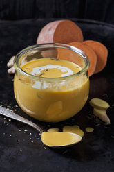 Glass of sweet potato soup with ginger and cream - CSF29024