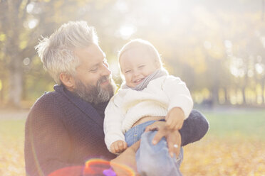 Father carrying son - FOLF05233