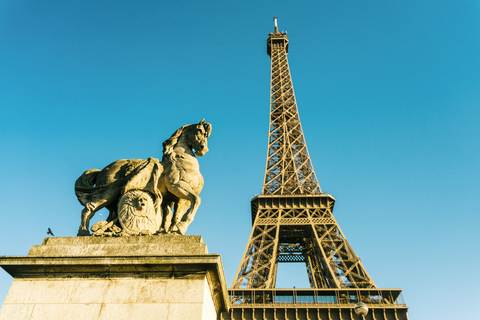 France, Paris, Eiffel Tower and horse sculpture in the foreground stock photo