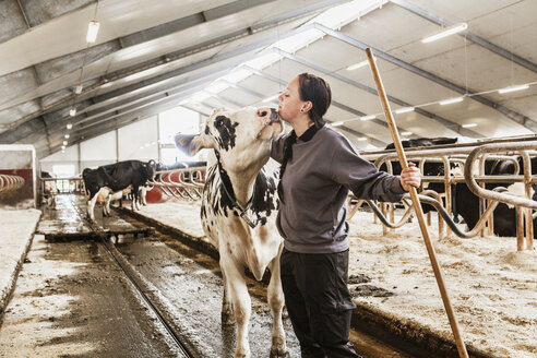 Female dairy farmer at work - FOLF05606