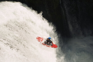 Kayaker descending from waterfall - CAVF31251