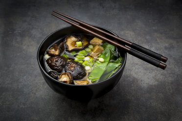 Japanese miso soup with sugar peas, shitake mushrooms, tofu and mung sprouts - LVF06832