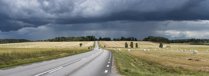 Storm clouds over country road - FOLF06038
