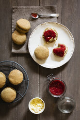 Scones made of einkorn wheat with strawberry jam and clotted cream - EVGF03335