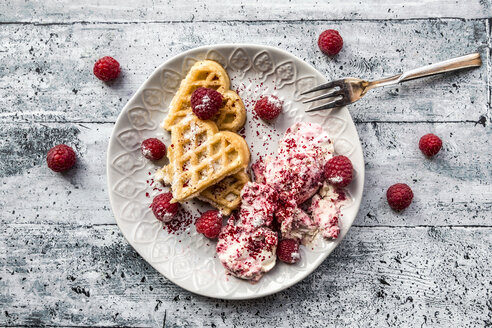 Homemade waffles with raspberry icecream, waffle hearts with raspberries - SARF03651