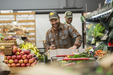 Male workers working at supermarket - CAVF33181