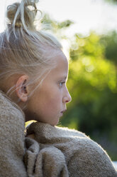 Portrait of pensive girl wrapped in blanket - FOLF07014