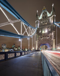 Pedestrian walkway of Tower Bridge in City of London at night - FOLF07407
