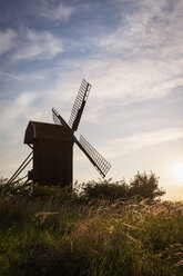 Silhouette of old windmill against sky - FOLF07778