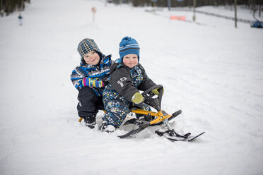 Boys tobogganing in Levi, Finland - FOLF08913