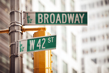 Low angle view of road sign in city - CAVF33979