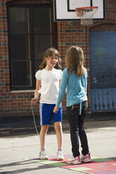 Two girls playing in schoolyard - FOLF09232
