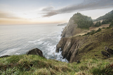 High angle view of cliff by sea against sky - CAVF34663