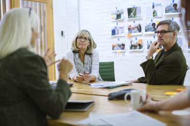 Business people brainstorming in meeting at board room - CAVF34801