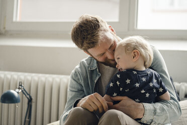 Father spending time with his son at home - KNSF03708