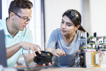 Colleagues working on computer equipment - ZEF15284