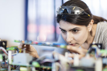 Woman working on computer equipment - ZEF15285